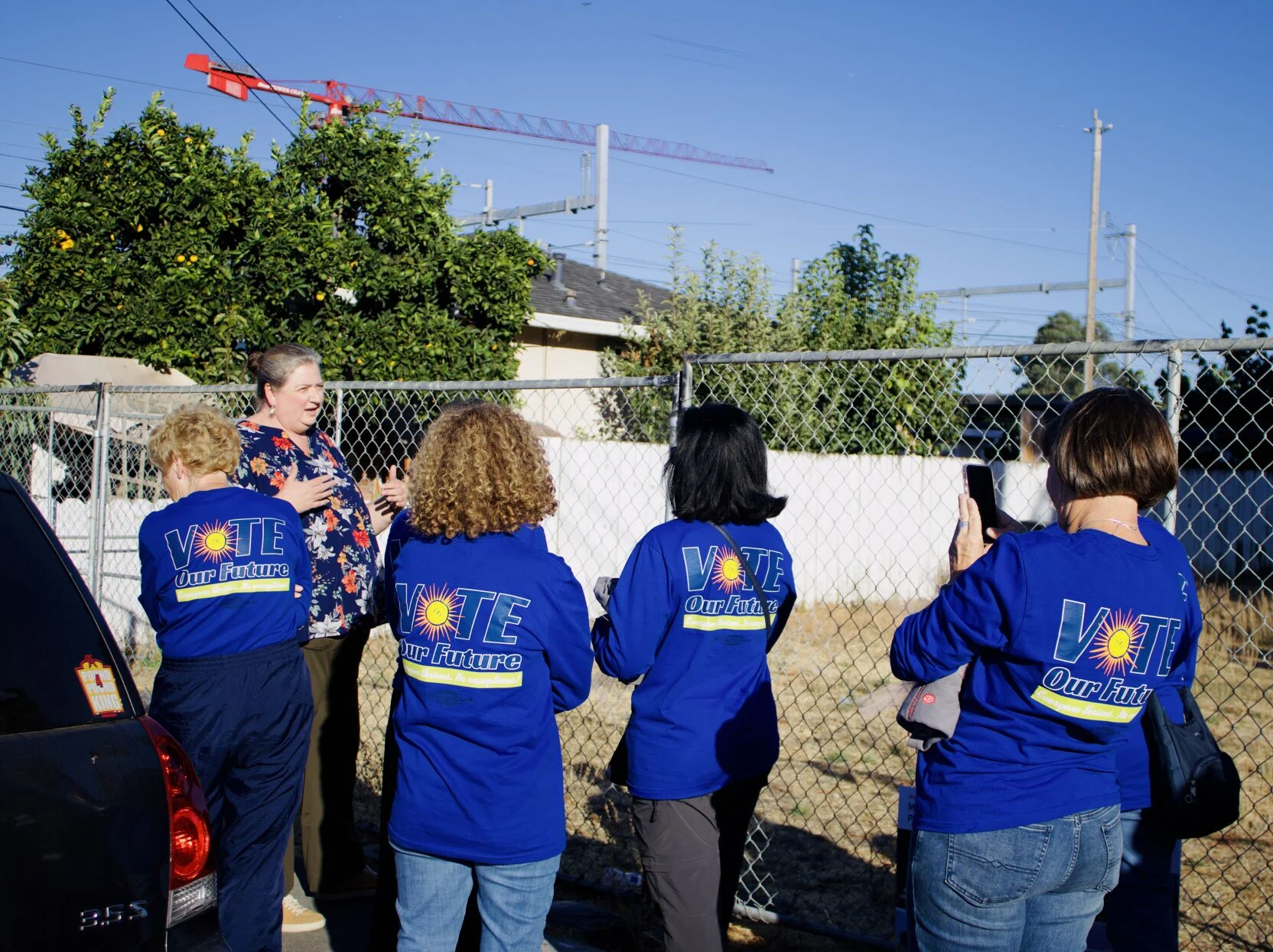 Kate Young, executive director of the Saint Francis Center in Redwood City, shows an empty parcel owned by the center that will become the site of a new all-accessible pocket park developed in collaboration with the Magical Bridge Foundation.